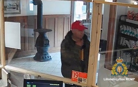 Pictured is the suspect walking in front of the camera. 