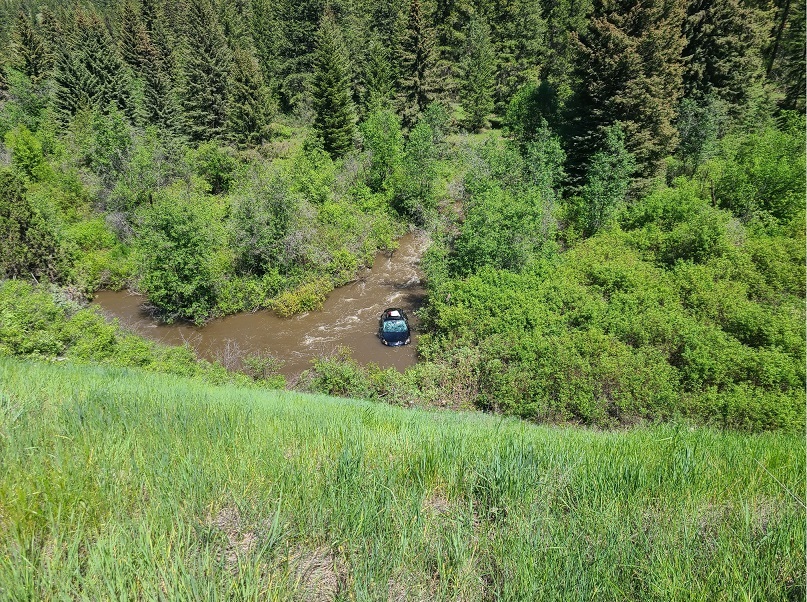 Car from distance resting in Hat Creek