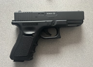 image of black imitation hand gun