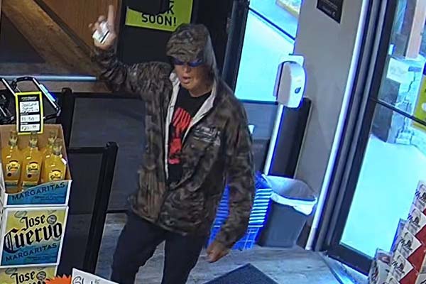 Photo of male suspect in a business