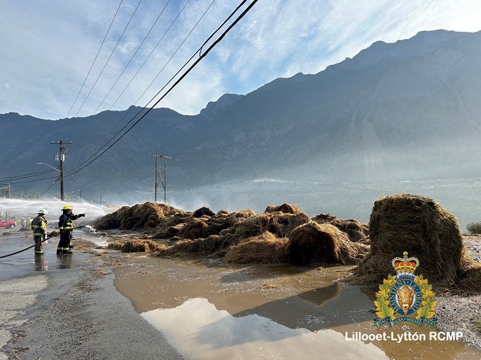 Pictured is the Lillooet Fire Department putting out a hay bale fire from Lillooet RCMP file 2024-1928.