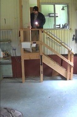 Person standing in a door way