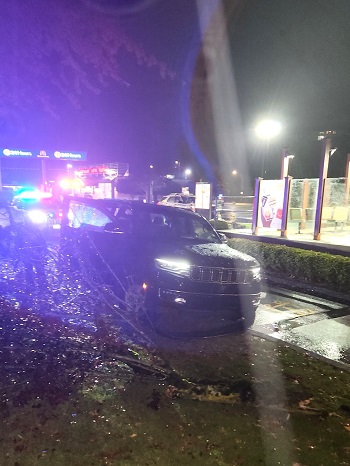 Photo of crashed Jeep in drive-thru lane