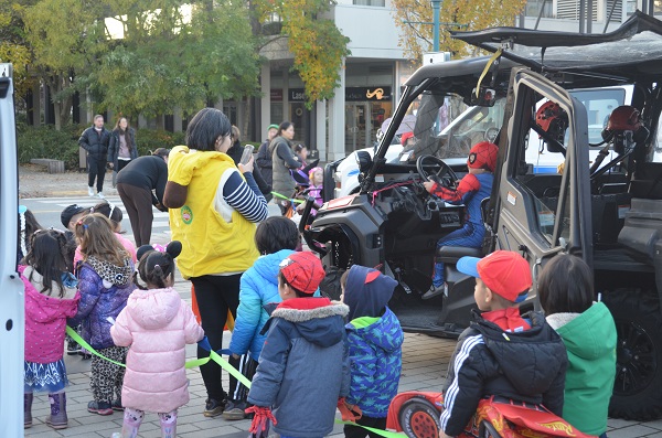  Costumed children check out a Search and Rescue vehicle at the 2023 Halloween Party
