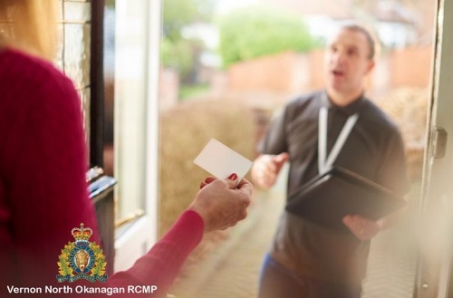 photo of person at door collecting donations