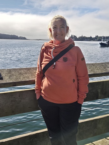 Photo of Sam enjoying some time off walking on the Sooke Boardwalk.  