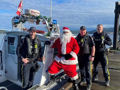 RCMP Members with Santa