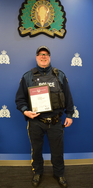Photo of Constable McCreadie holding his 2023 Alexa&rsquo;s Award.
