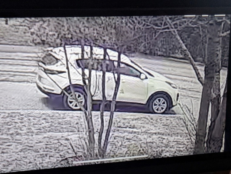 White four door sport utility, believed to be a kia sportage, parked on Irvine Avenue in Merritt.