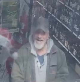 Gros plan de Mark Hoffman &agrave; l&rsquo;int&eacute;rieur du magasin d&rsquo;alcools Jimmy&rsquo;s