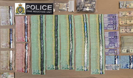 Photo of the genuine Canadian currency seized by police. 