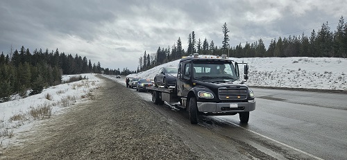 Tow truck towing vehicle