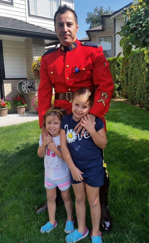 Sgt. Musinovic and his amazing daughters.