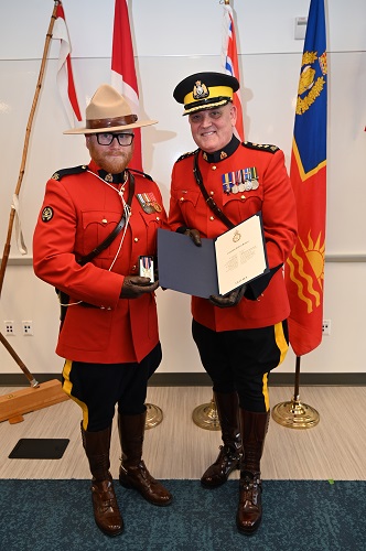 Cst. Rob Renner presented his King Charles III Coronation Medal by Vancouver Island District Commander, Chief Superintendent Bruce Singer during a ceremony on March 20, at the North Cowichan/Duncan detachment. 