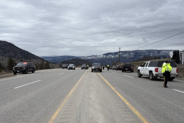 BC Highway Patrol officers working a check stop on Highway 3A near Penticton