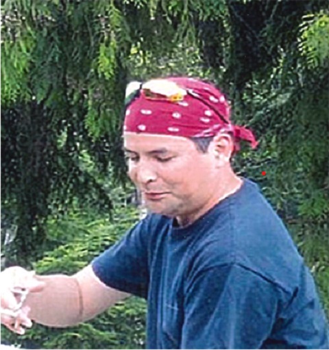 James Robinson wearing red bandana