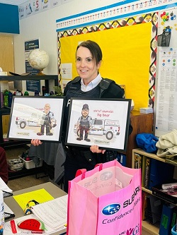 Supt. McAndie presenting plaques