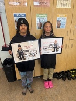 Contest winners with plaques