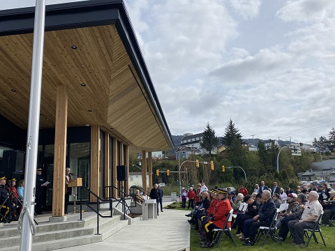 Speakers at the podium in front of guests