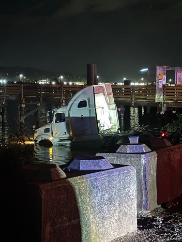 picture of semi truck in the water