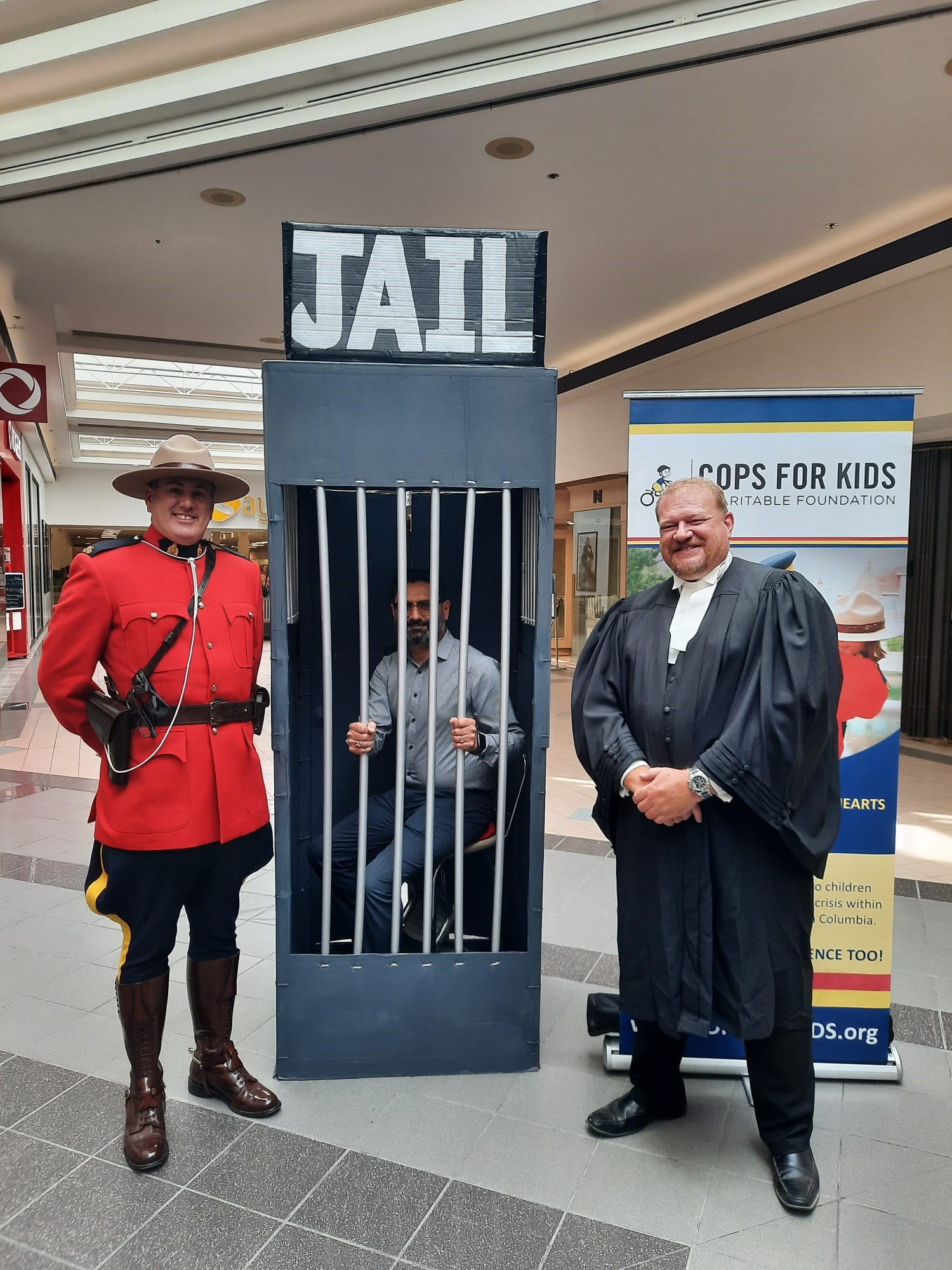 "Caught in the act....of kindness! Raising bail for Cops for Kids, one arrest at a time!"