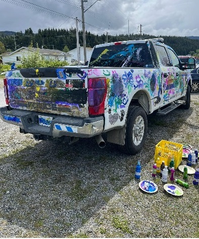 RCMP marked police truck painted colorfully while at Haisla Days