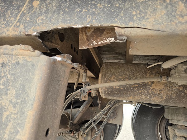 Sheared-off metal on a tractor-trailer stopped by BC Highway Patrol