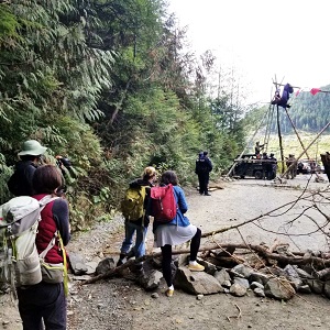 Image of individual being extracted from a tripod 