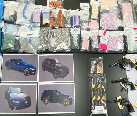 Bags on table filled with multiple types of drugs