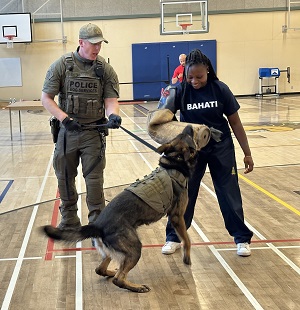 Cst Matthew Tomasson and Herc with youth as a quarry