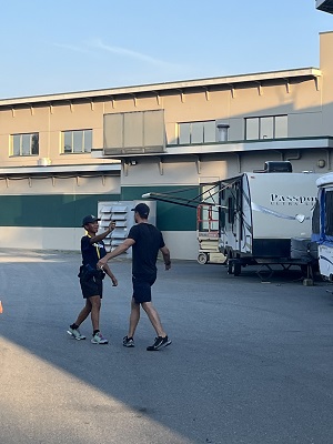 Youth practicing pepper spray in scenario-based training