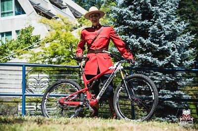 Sgt. David Vunic in red serge with his bike
