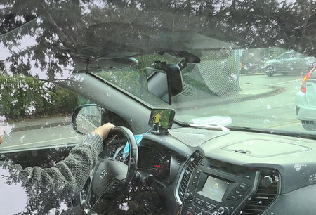 Photo of driver watching World Cup on cell phone