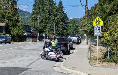 Photo of Constable Scott checking vehicle speeds