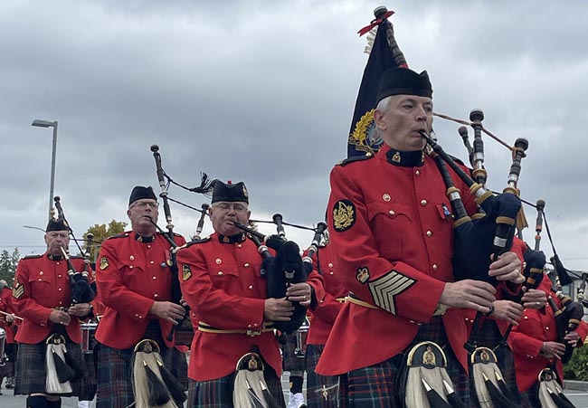 E Division Pipes and Drums band marching