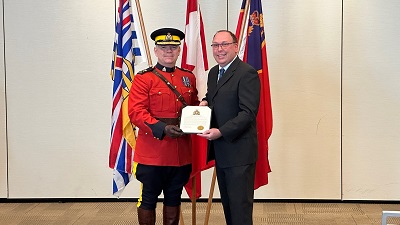 Municipal employee Justin Hazard receiving the Commanding Officer&rsquo;s Unit Commendation for his role in the Penticton mass shooting of 2019.