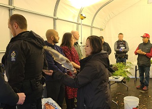 3.&#9;BC Conservation Officer being smudged prior to harvest