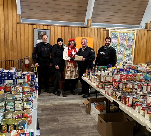 Members and Staff Presenting Donation
