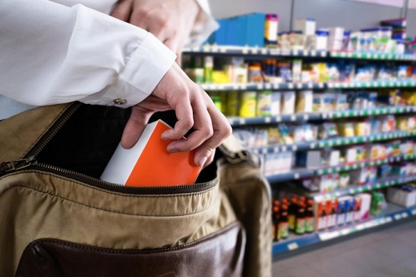 stock photo depicting shoplifting