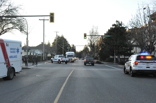ambulance and police car at intersection 