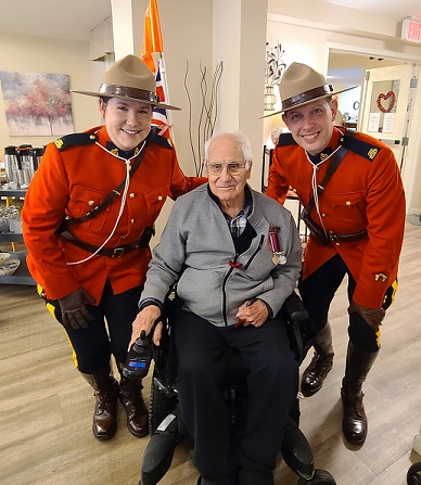 (Cst. Justina Webb, Mr. John Dumbeck and Cst. John Varley)